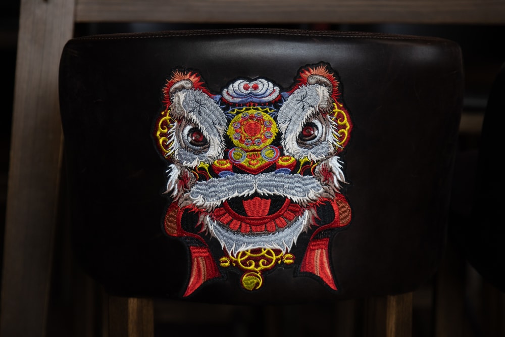 Embroidered lion on a seat back