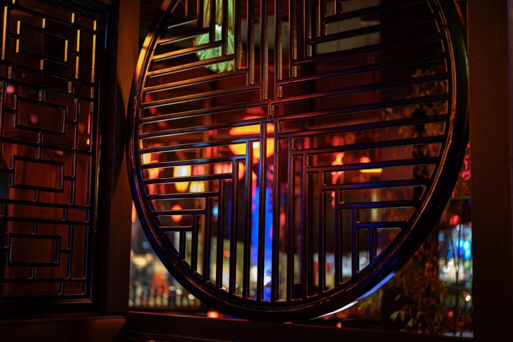 The moon gate window glowing at night