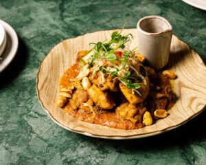 Traditional chicken satay with roasted peanuts at Zodiac