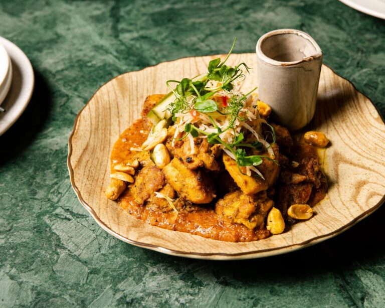 Traditional chicken satay with roasted peanuts at Zodiac